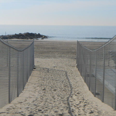 Fencing on a beach